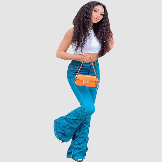 Vaqueros plisados elásticos de color liso