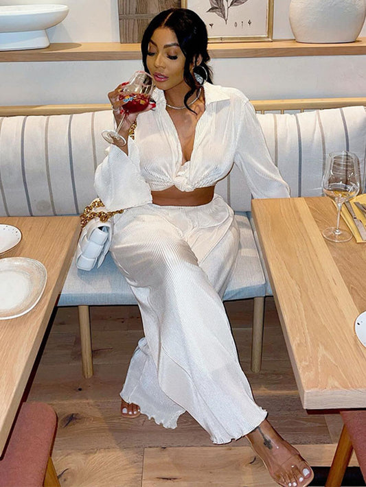 Dos piezas plisadas de manga larga y pantalones largos