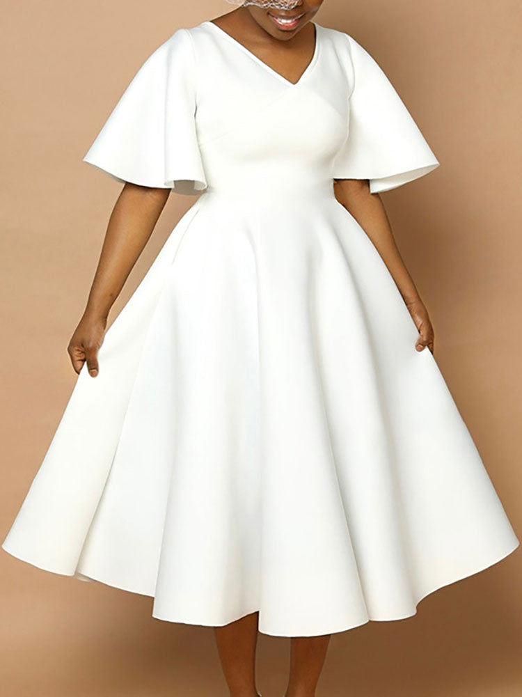 Vestido acampanado con cuello en V y mangas acampanadas de color liso