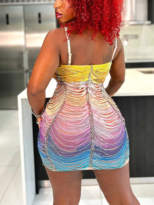 Minivestido con diamantes de imitación y borlas de color degradado