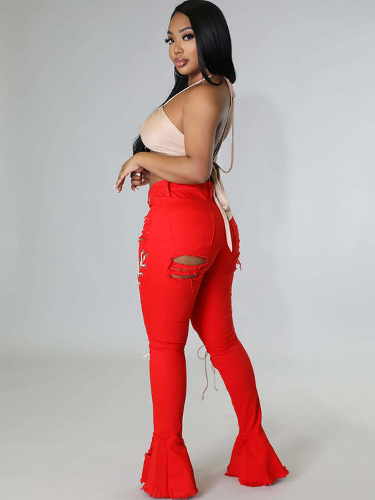 Vaqueros acampanados ajustados con roturas cruzadas y denim