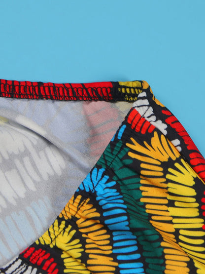 Vestido largo sin espalda con cuello halter y estampado colorido 