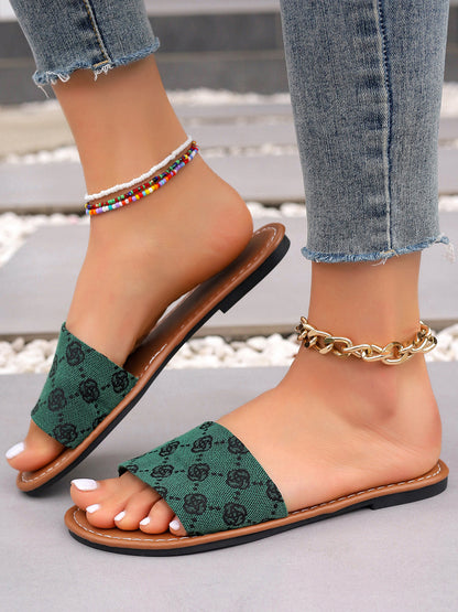 Chanclas planas con estampado informal 