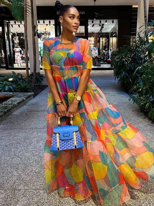 Vestidos largos fluidos con estampado de manga corta de malla